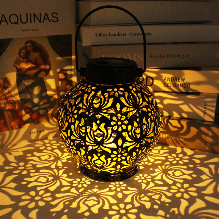 Solar iron hollow projection lamp